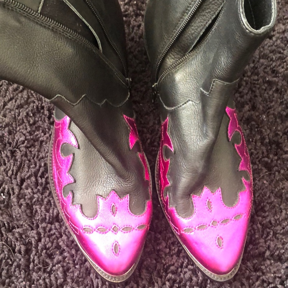 Black leather booties with pink accent